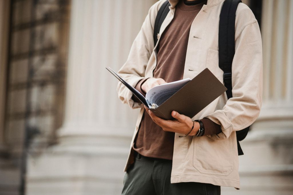 Student reading documents